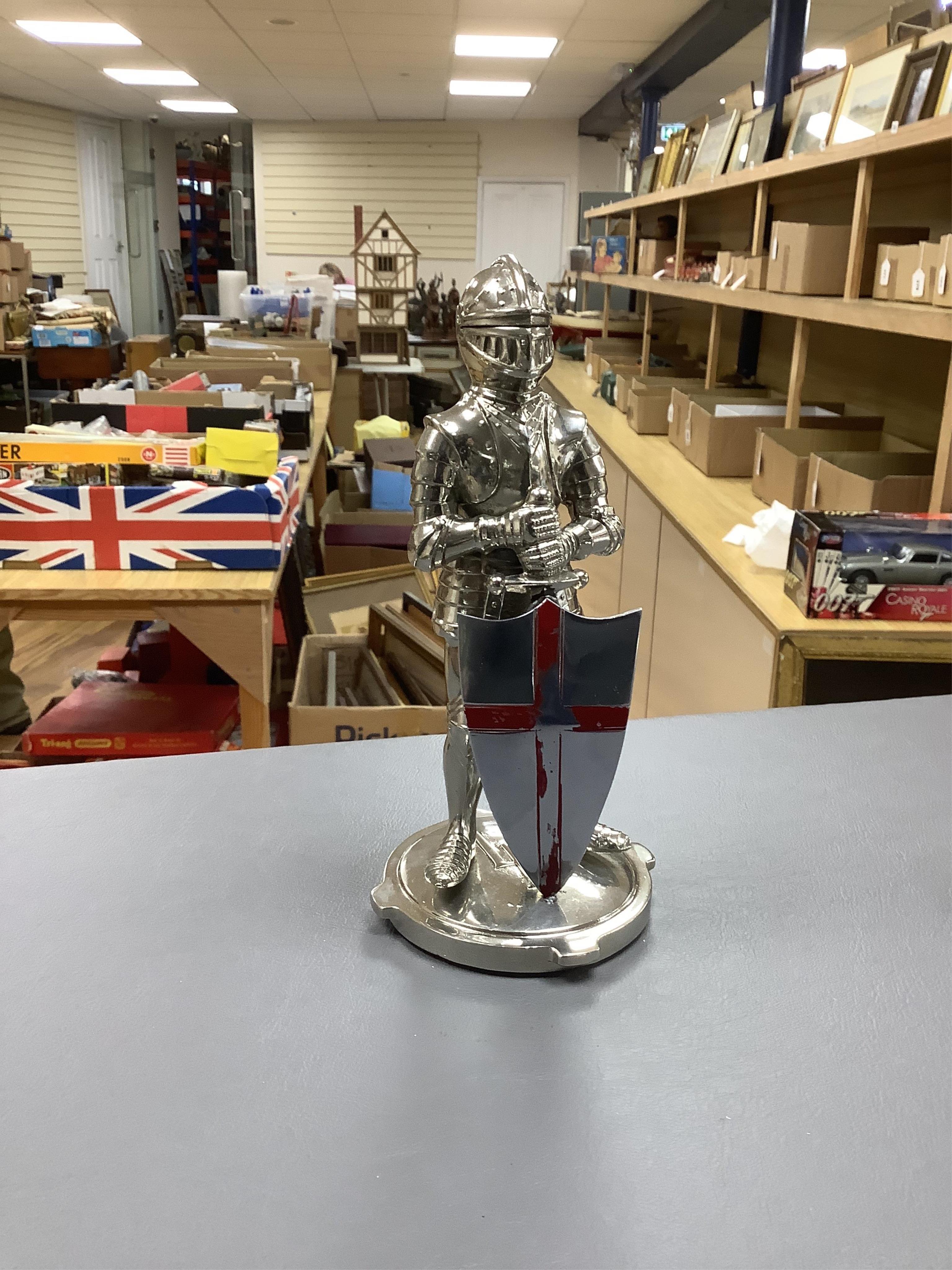 Eight figural chrome and brass car mascots, etc. including a knight in full armour mounted on a threaded radiator cap, a sphinx mounted on a threaded radiator cap, plus an additional sphinx mounted on an alabaster plinth